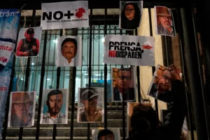 wall with journalist photos who have been killed in Mexico