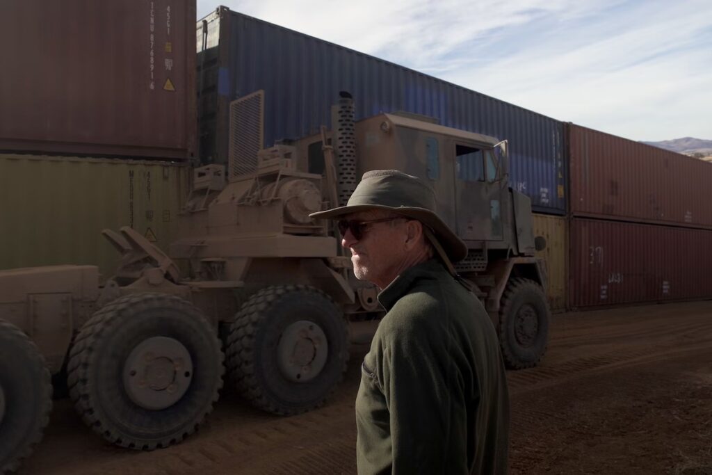 Man standing in front of truck in Arizona